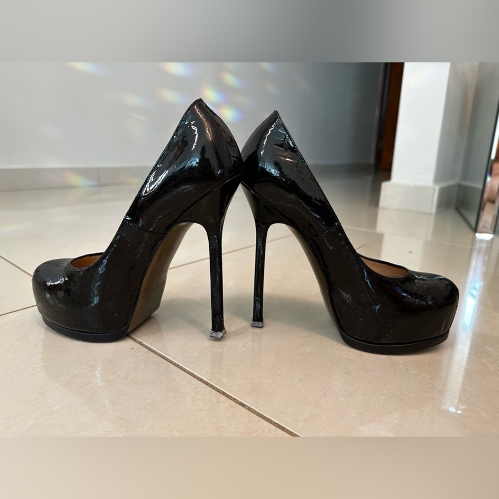 Dark brown patent leather YSL tribute pumps
